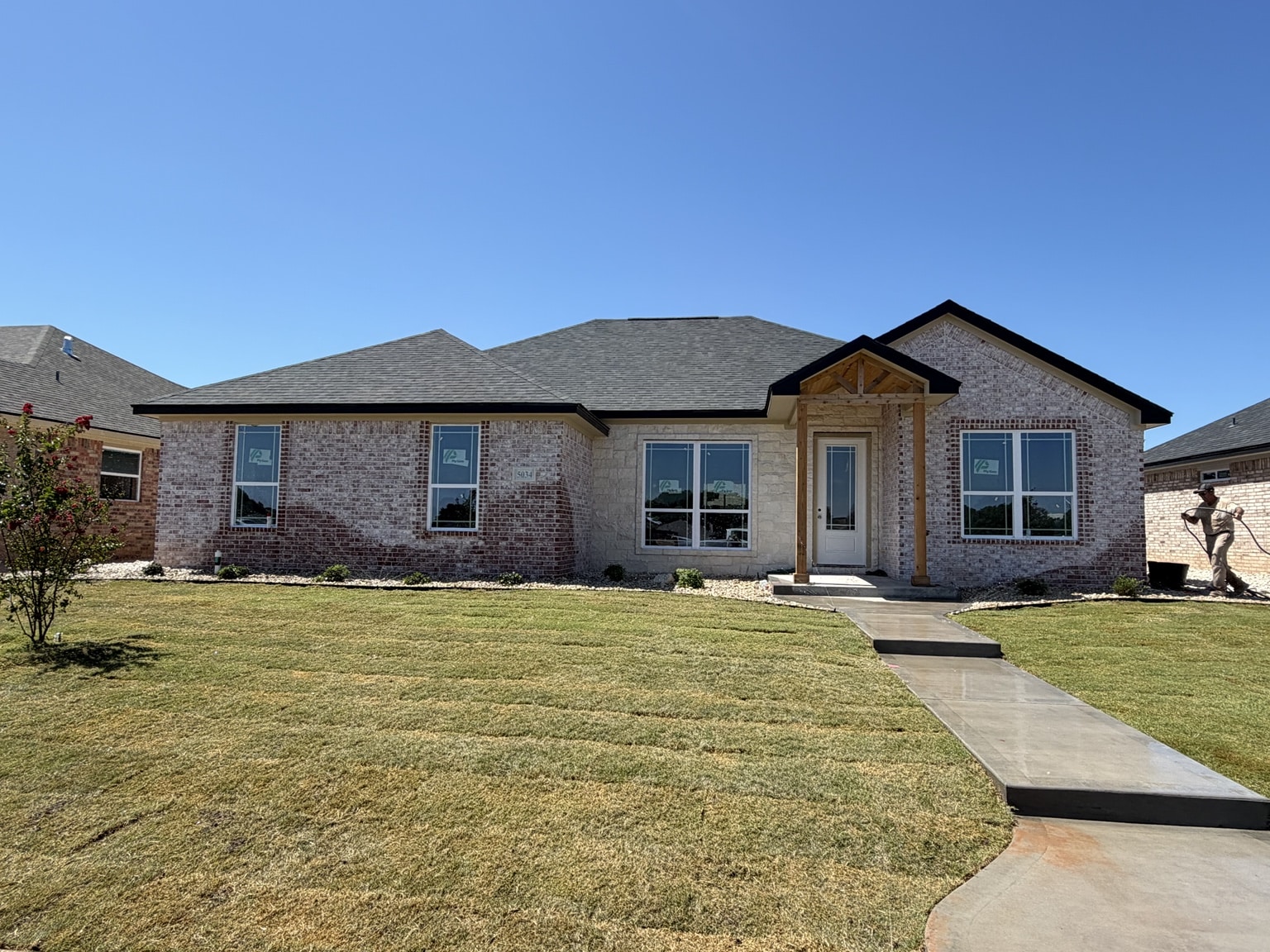 A Dragt-built single-story brick and stone home in San Angelo, Texas
